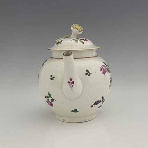 968 - A Worcester polychrome teapot and cover, circa 1765, painted in the Back to Back Floral pattern, sph... 