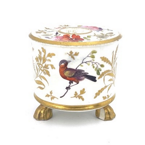 976 - An English porcelain inkstand, circa 1820, drum shape, painted in polychrome with foliage and birds,... 