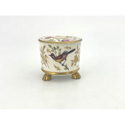 976 - An English porcelain inkstand, circa 1820, drum shape, painted in polychrome with foliage and birds,... 