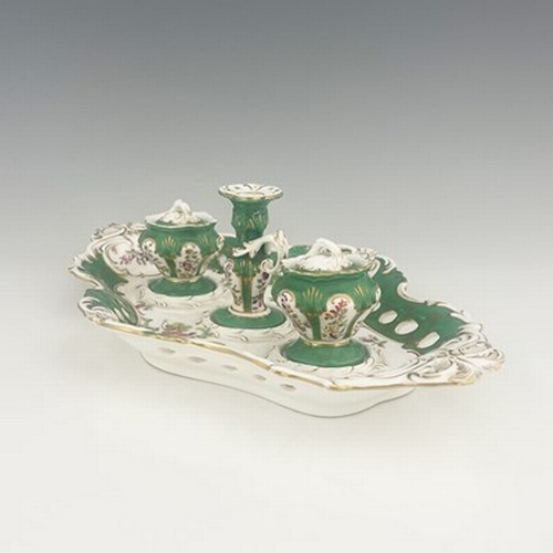 980 - A Coalport desk stand, including a pair of inkwells and covers, and candlestick, painted with flower... 