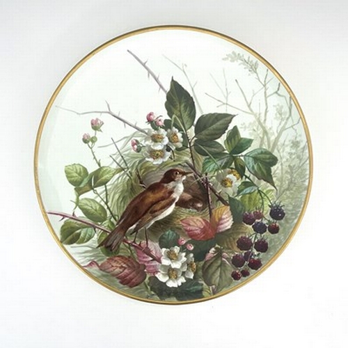 982 - A Continental porcelain painted plaque, decorated with a thrush and nest in blackberry brambles, imp... 