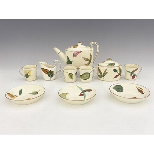 986 - A Wedgwood Queensware tea set, circa 1870s, painted in the Derby style with Autumnal leaves, Neoclas... 