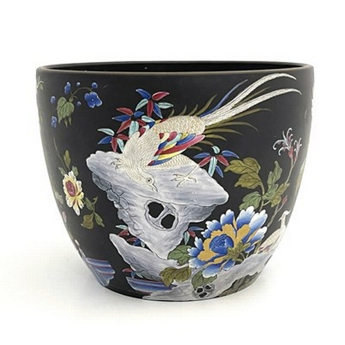 992 - A Wedgwood Capri Ware jardiniere, circa 1810, black basalt ground enamelled with Chinese prunus, roc... 