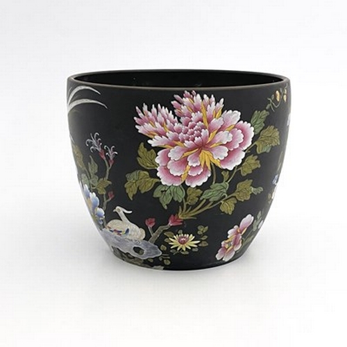 992 - A Wedgwood Capri Ware jardiniere, circa 1810, black basalt ground enamelled with Chinese prunus, roc... 