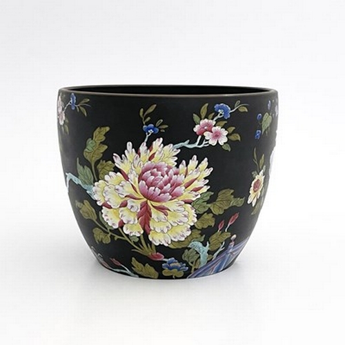 992 - A Wedgwood Capri Ware jardiniere, circa 1810, black basalt ground enamelled with Chinese prunus, roc... 