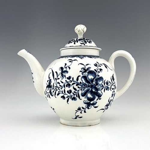 999 - A Lowestoft blue and white porcelain teapot and cover, crescent mark, circa 1770, decorated in the M... 