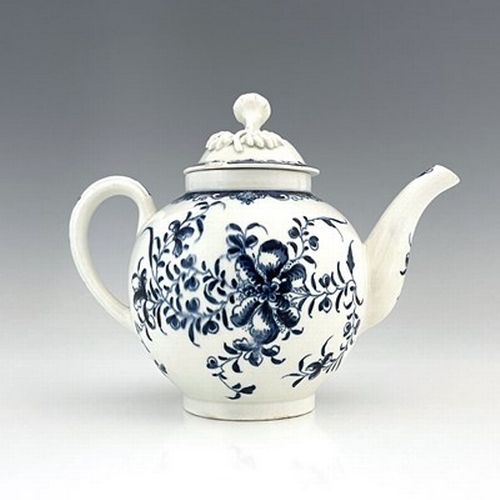 999 - A Lowestoft blue and white porcelain teapot and cover, crescent mark, circa 1770, decorated in the M... 