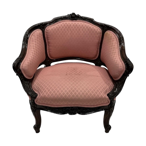 510 - A rosewood boudoir fauteuil, of Louis XV design, serpentine top rail with foliate carving, outswept ... 