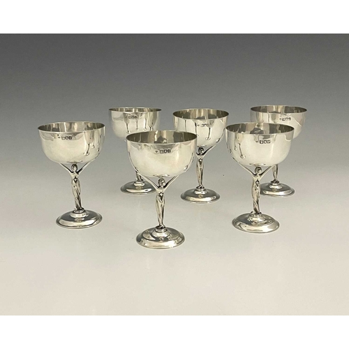 A Set Of Six Edwardian Silver Wine Cups Each With Cast Figural Stem Of A Maiden In A Flowing Gown W