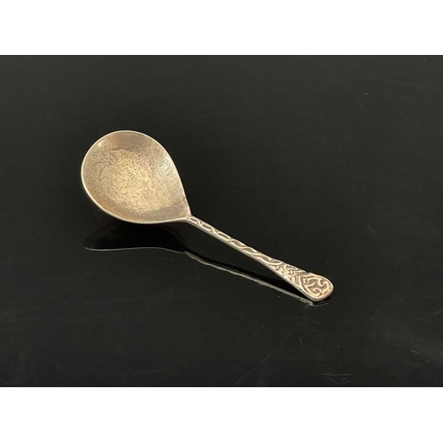 A twentieth-century Arts & Crafts silver caddy spoon, with planished ...