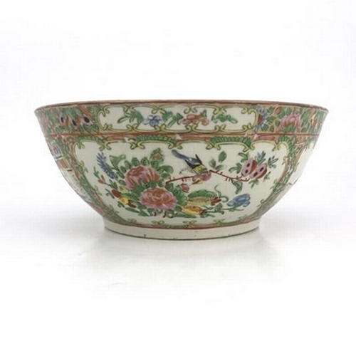 176 - A Chinese Canton Famille rose bowl, Qing Dynasty, 19th Century, decorated with panels of narrative f... 