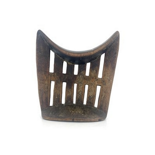 193 - An African Tribal carved wooden headrest, Kambatta, Ethiopia, reticulated trellis design with geomet... 