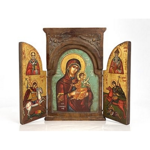 196 - A Greek Orthodox triptych ikon, wooden frame with leaf-carved spandrels to the pediment, hinged doub... 