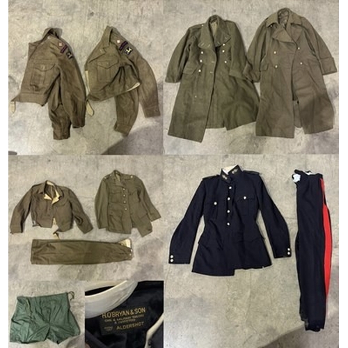 1A - A collection of Military apparel, to include two Royal Artillery battle dress jackets, two Royal Art... 