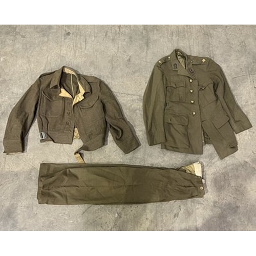 1A - A collection of Military apparel, to include two Royal Artillery battle dress jackets, two Royal Art... 