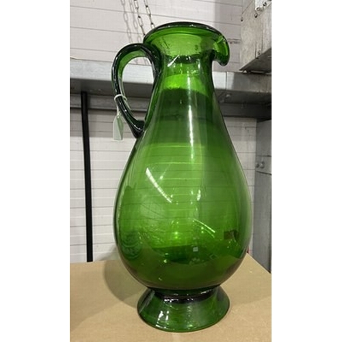 209 - Large hand blown green jug, 43cm high