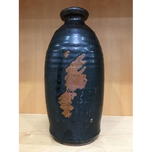 238A - A Tenmoku type studio pottery vase, elongated ovoid form, with abstract motif, 23cm high