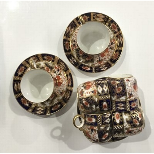 247 - A collection of Davenport Imari pattern coffee cups and saucers