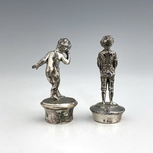 292 - WMF, two silver plated figural bottle stoppers, one modelled as a boy in lederhosen, the other as a ... 