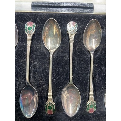 299 - A quantity of silver spoons including hallmarked examples, a cased set with enamel thistle decoratio... 