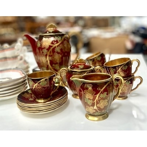 30 - A Coalport tea service together with a  Carlton Ware 1950s 'Rouge Royale' Vine pattern coffee servic... 