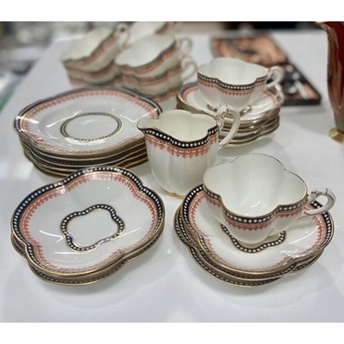 30 - A Coalport tea service together with a  Carlton Ware 1950s 'Rouge Royale' Vine pattern coffee servic... 