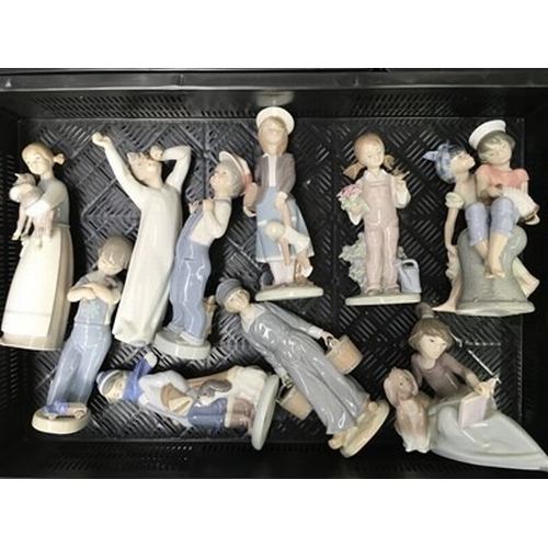 36 - A collection of ten Lladro figures, including A Lesson Shared, Caribbean Kiss, Dutch Boy with Milk P... 