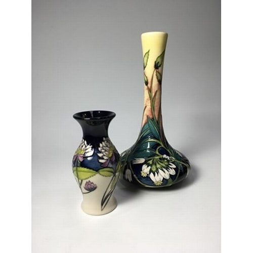 446 - Nicola Slaney for Moorcroft, a Comfrey pattern Trial vase, squat onion form, tubelined and painted d... 