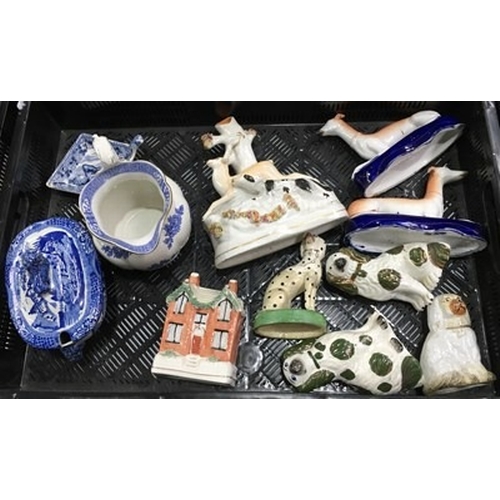 55 - Collection of Staffordshire ceramics including a house money box, flatback spill vase, dog hunting a... 