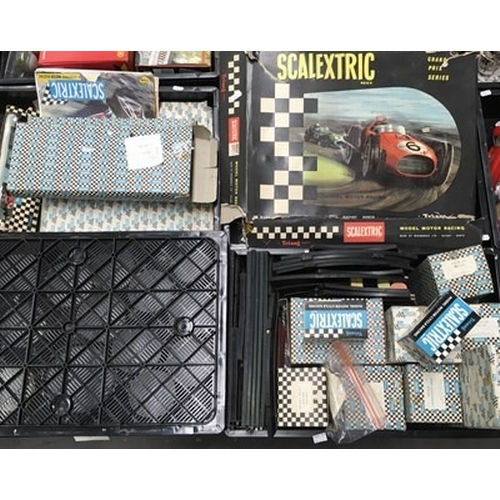 63 - A large collection of Scalextric to include track, buildings, figures, motorbikes etc ( 3 trays )