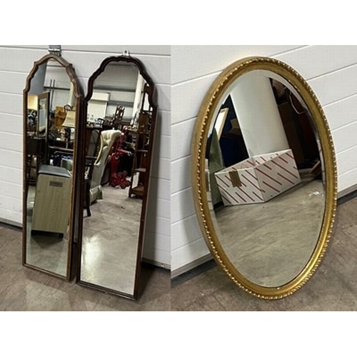 769 - Two converted cheval mirrors 33 x 128 cm, and 36 x 130 cm, together with a oval, gilt, bevelled edge... 