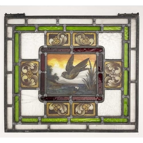 246 - Two Aesthetic Movement leaded glass panels, painted with birds in flight over wetlands, within conce... 