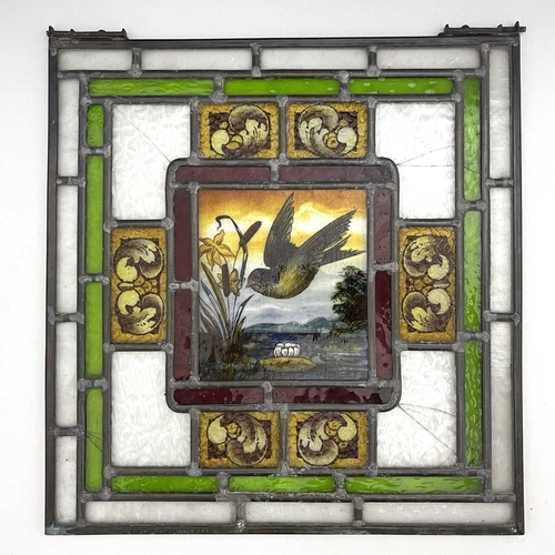 246 - Two Aesthetic Movement leaded glass panels, painted with birds in flight over wetlands, within conce... 