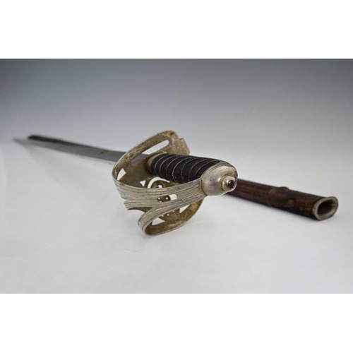 308 - A World War I 1827 pattern Rifle Brigade officers sword, with black sharkskin handle, in leather sca... 