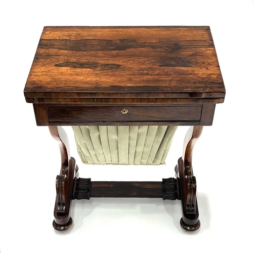 326 - A Regency rosewood work and games table combined, circa 1820, fold-over top with green baize lining,... 