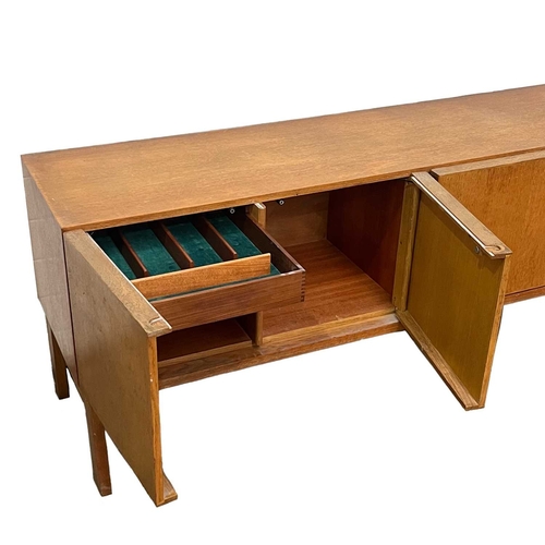 333 - A Gordon Russell oak sideboard, 1960s,183cm wide, 50cm deep, 73 cm high