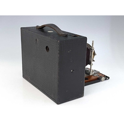 341B - An Eastman Kodak Cartridge concertina camera, brown bellows, with ivorine Sands Hunter plaque, 16cm ... 