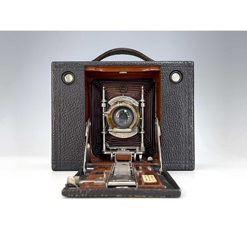 341B - An Eastman Kodak Cartridge concertina camera, brown bellows, with ivorine Sands Hunter plaque, 16cm ... 