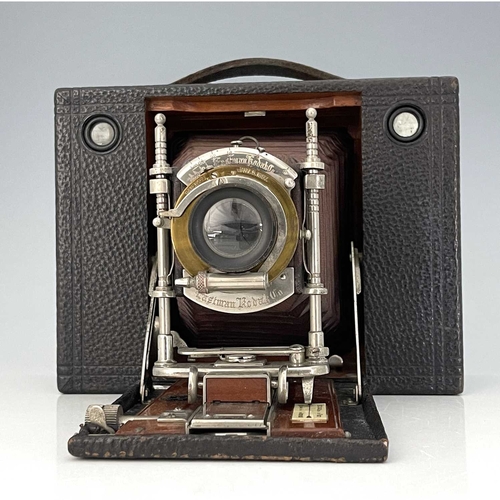 341B - An Eastman Kodak Cartridge concertina camera, brown bellows, with ivorine Sands Hunter plaque, 16cm ... 