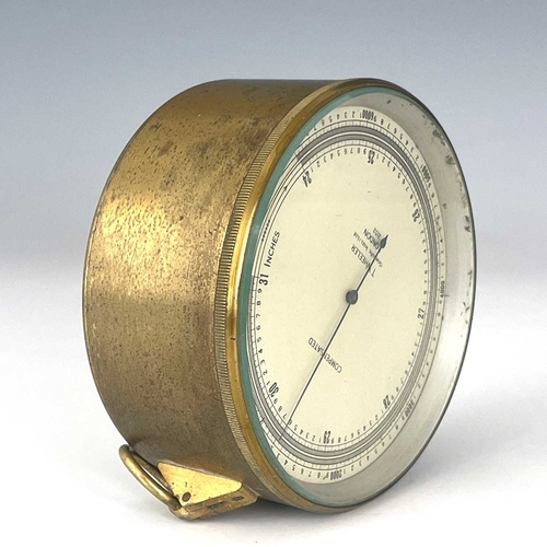 341 - T. Wheeler, London, an early 20th Century Compensated brass military marine barometer, silvered dial... 