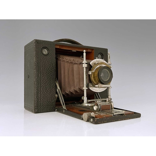 341B - An Eastman Kodak Cartridge concertina camera, brown bellows, with ivorine Sands Hunter plaque, 16cm ... 