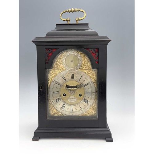 346 - John Clark, London, a George II ebonised bracket clock, caddy top with a brass swing handle, arched ... 