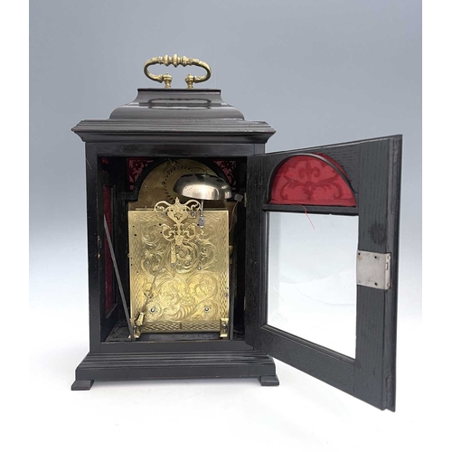 346 - John Clark, London, a George II ebonised bracket clock, caddy top with a brass swing handle, arched ... 