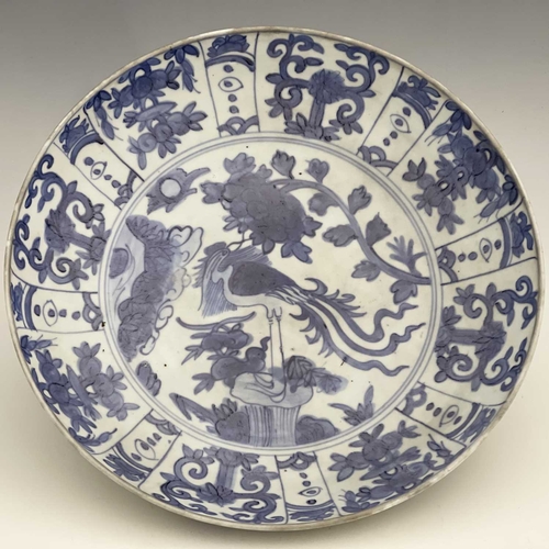 347 - A Chinese famille verte dish, Ming, circular form, painted with a central landscape within an iron r... 