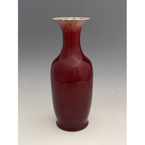 360 - A Chinese sang de boeuf monochrome vase, shouldered form with flared rim, 40cm high