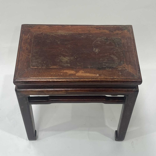 372 - A Chinese stained and lacquered wood low table or stool, probably 19th century or earlier, rectangul... 