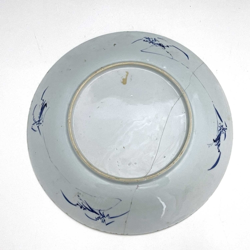 375 - Two Chinese blue and white plates, lotus mark, painted in the Kangxi style, circular ogee moulded ri... 