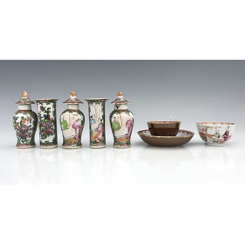 383 - Chinese famille rose ceramics including a miniature altar garniture of five vases, in the Canton sty... 