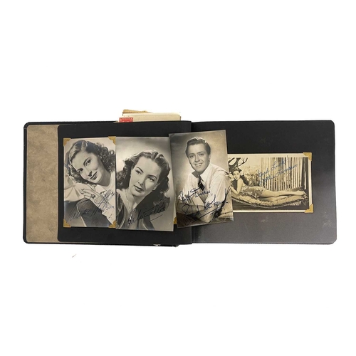 386 - An album of photographs relating to stars of the screen, 1930's to 1940's, some signed, some with fa... 