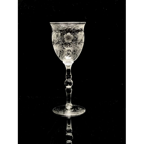 539 - Stevens and Williams, an Edwardian Stourbridge intaglio cut hock wine glass, circa 1905, the flared ... 